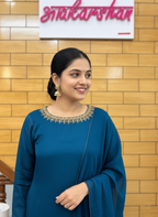 The Elegant Crepe Suit Set Featuring Fine Aari Work