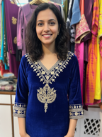 Luxurious Velvet Ensemble Featuring Traditional Aari Detailing