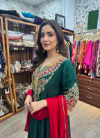 Regal Emerald Green Silk Dress with Intricate Gold Aari Work