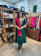 Regal Emerald Green Silk Dress with Intricate Gold Aari Work