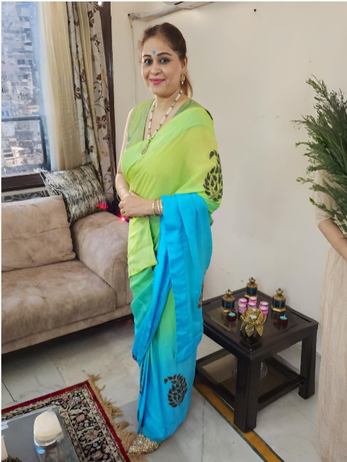 Flowing Georgette Fabric Saree Enhanced by Delicate Appliqué Work