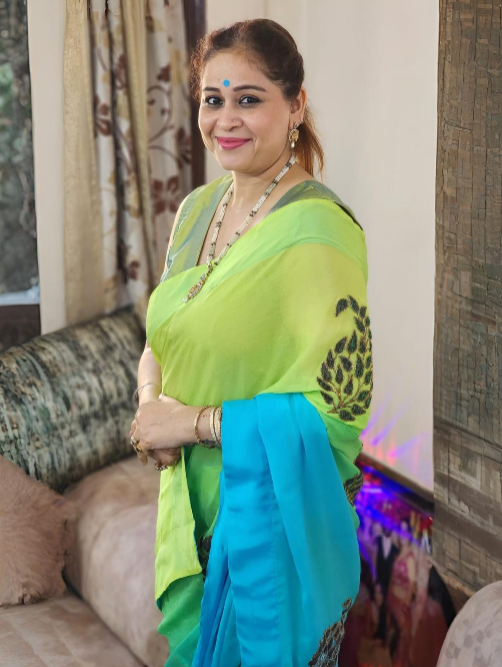 Flowing Georgette Fabric Saree Enhanced by Delicate Appliqué Work