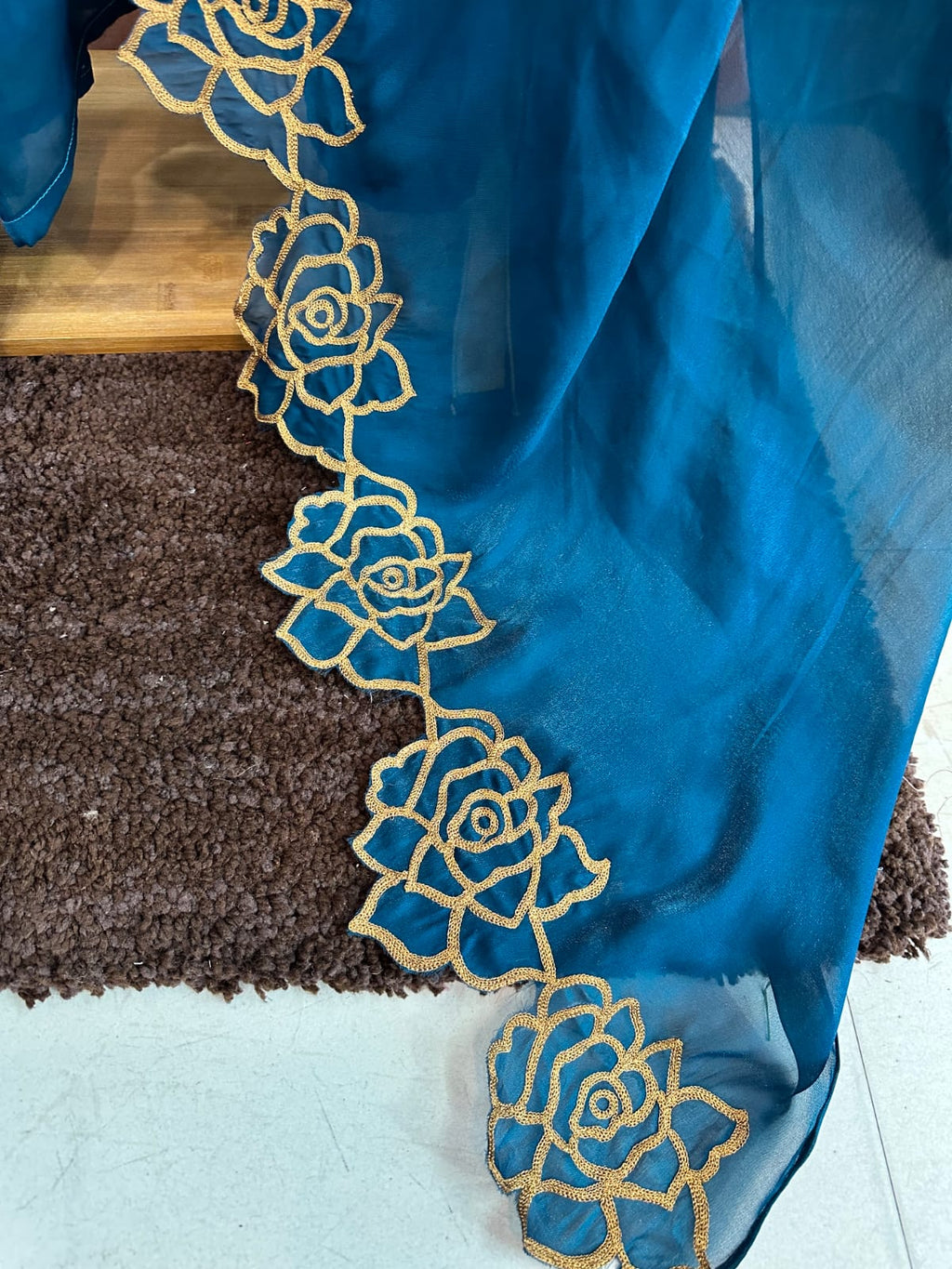 The Elegant Crepe Suit Set Featuring Fine Aari Work